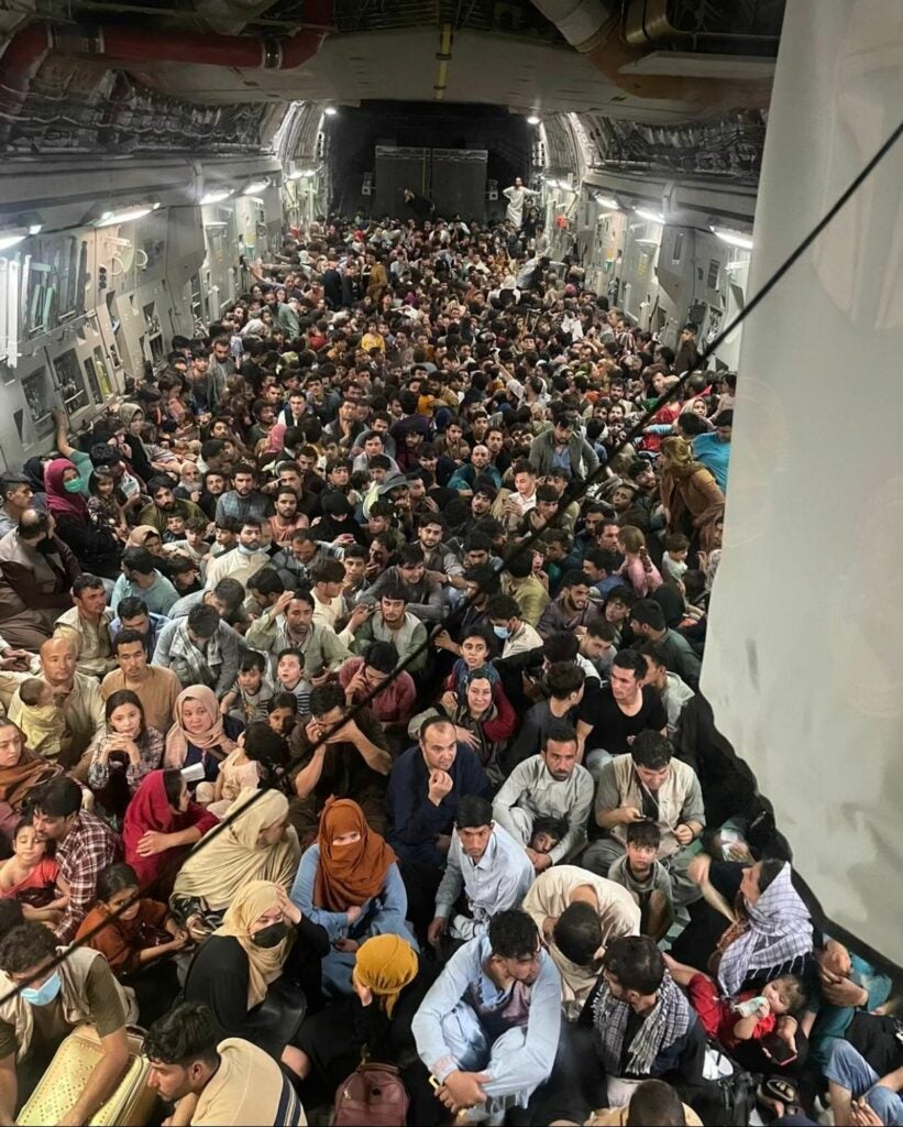 A photo inside the cargo hold of one of the C-17s evacuating Afghan refugees from Hamid Karzai International Airport (Facebook / Air Force photo)