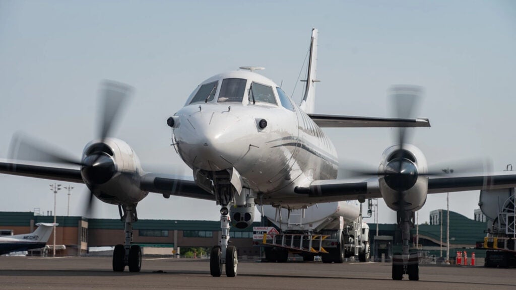 A U.S. Air Force RC-26B Metroliner aircraft assigned to the 162nd Fighter Wing, Arizona Air National Guard, sits on the flight line prior to departing on a wildland fire mapping and detection mission in support of the U.S. Forest Service at the Eugene Airport, Eugene, Ore., August 1, 2021.   (U.S. Air National Guard photo by Airman 1st Class Thomas Cox)
