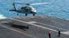 FILE PHOTO: An MH-60S Knighthawk helicopter, assigned to the ÏDusty DogsÓ of Helicopter Sea Combat Squadron 7, lands on the flight deck of the aircraft carrier USS Harry S. Truman. (U.S. Navy photo by Mass Communication Specialist Seaman Pasquale Sena/Released)