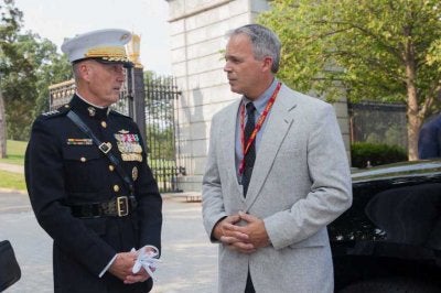 Robert Hogue stands with then-commandant Gen. Joseph Dunford, at Arlington National Military Cemetery. (Photo courtesy of Robert Hogue.)