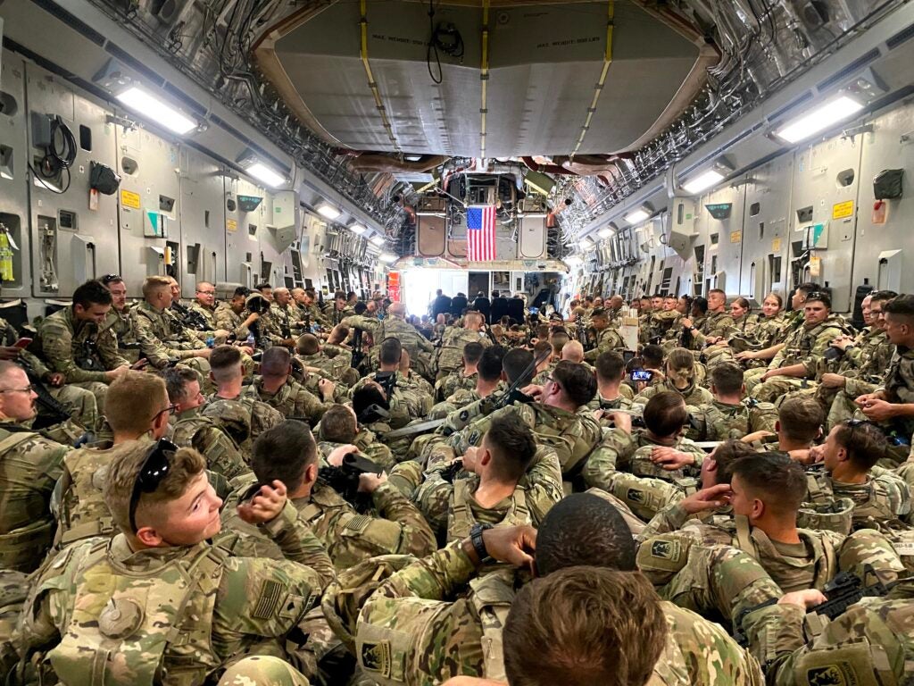 National Guard Soldiers from the Minnesota-based 34th Infantry Division pack a U.S. Air Force-operated C-17 in August following the completion of their mission in Kabul, Afghanistan. 



Deployed in support of Operation Spartan Shield, about 400 Soldiers from 34th ID were temporarily relocated to Kabul, Afghanistan, and have since arrived safely in Kuwait, where they are assigned. (U.S. Army photo by Capt. Charles Anderson)