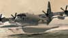 Air Force concept art of an MC-130J Commando II transport plane equipped with floats below the fuselage (Air Force illustration)