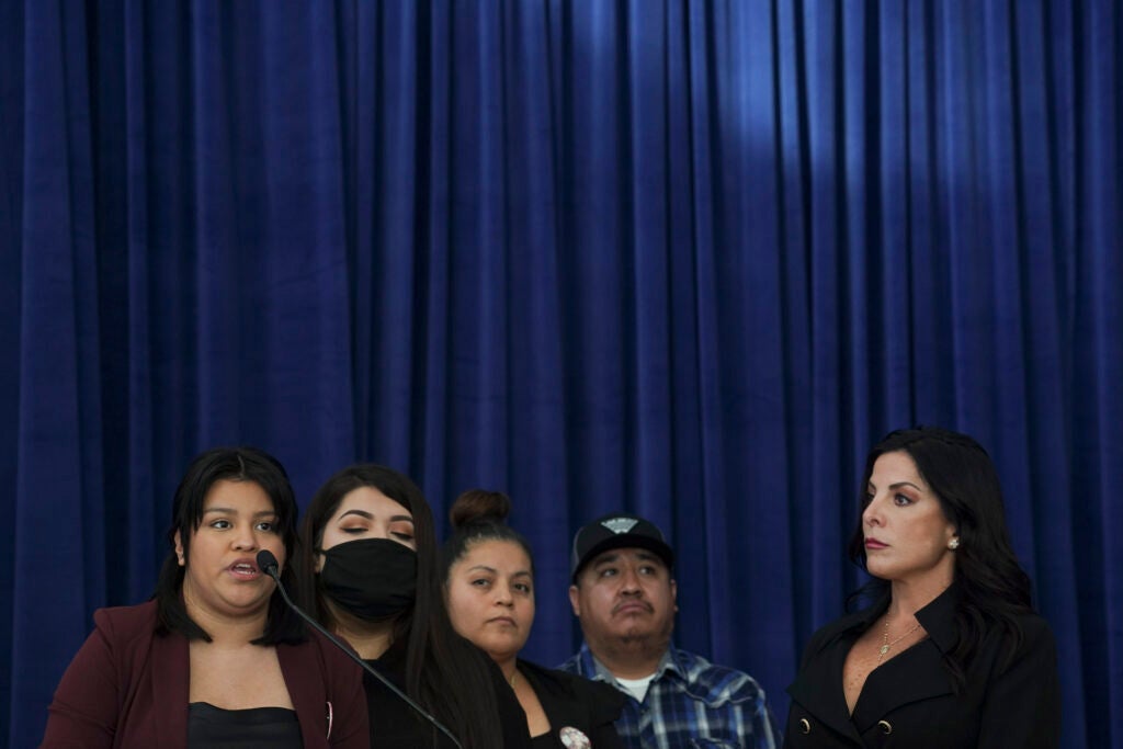 HOUSTON, TX - DECEMBER 08: From left, Vanessa Guillen's sister Lupe Guillen, Vanessa's sister Myra Guillen, Vanessa's mother Gloria Guillen, Vanessa's father Rogelio Guillen, and the attorney of Guillen family Natalie Khawam attend a press conference regarding the murder of Vanessa Guillen on December 8, 2020 in Houston, Texas. Vanessa Guillen, a 20-year-old U.S. Army Specialist, was found dead on June 30 after she had been reportedly missing since April 22. Guillen was allegedly killed by fellow soldier Aaron David Robinson inside the Fort Hood military base.(Photo by Go Nakamura/Getty Images)