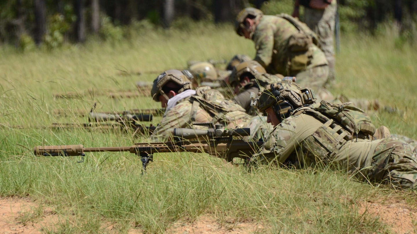 Special Operations Snipers zero their MK-22 Precision Sniper Rifles (PSR) before military free fall test trials on Range 61, Fort Bragg, North Carolina. (Photo by Mr. Barry Fischer, Audio Visual Production Specialist, U.S. Base and Test Support Services contractor)