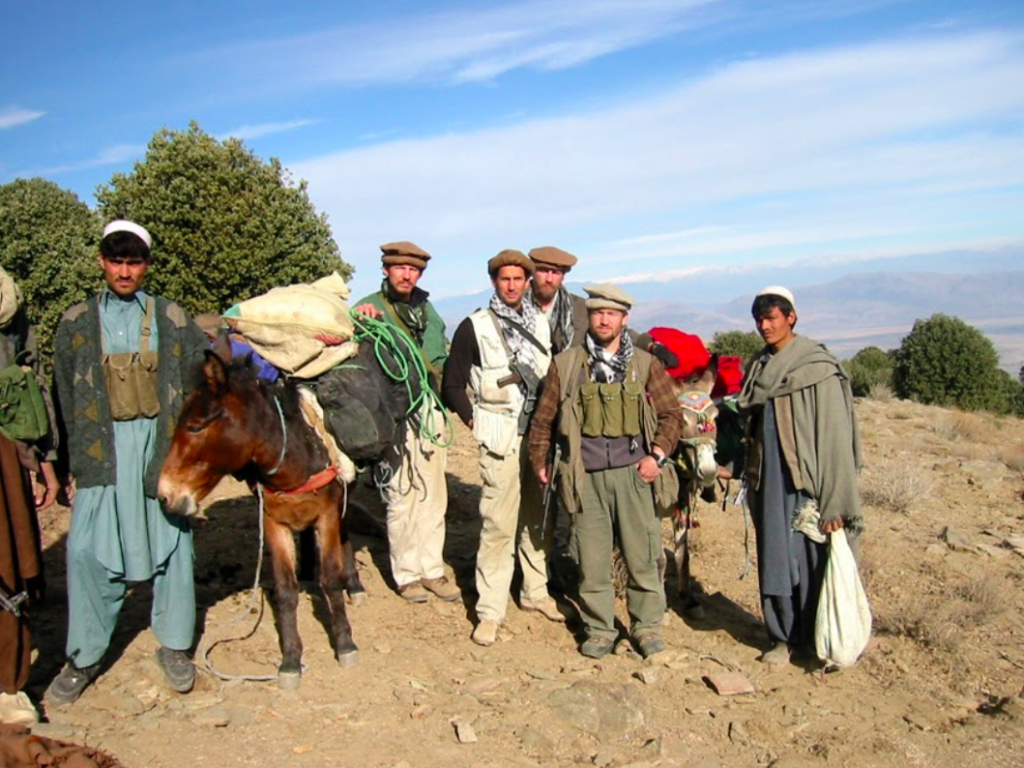 Joe O'Keefe, other operators and Afghan allies in Afghanistan. O'Keefe is the one standing at the tail end of the donkey. (Photo courtesy Joe O'Keefe)