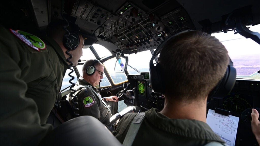 Lt. Gen. Michael Minihan, center, pilots a C-130J Super Hercules over Central Arkansas, Sept. 17, 2021. A command pilot with more than 3,400 flight hours, Minihan completed his senior officer course on the C-130J during a recent visit to LRAFB. Minihan was promoted to the rank of General prior to assuming command of Air Mobility Command on Oct. 5, 2021. (U.S. Air Force photo by Senior Airman Jayden Ford)