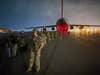 Paratroopers assigned to the 82nd Airborne Division prepare to board a U.S. Air Force C-17 on August 30th, 2021 at the Hamid Karzai International Airport. Maj. Gen. Donahue was the last American Soldier to leave Afghanistan ending the U.S. mission in Kabul. (U.S. Army photo by Master Sgt. Alexander Burnett, 82nd Airborne Public Affairs).