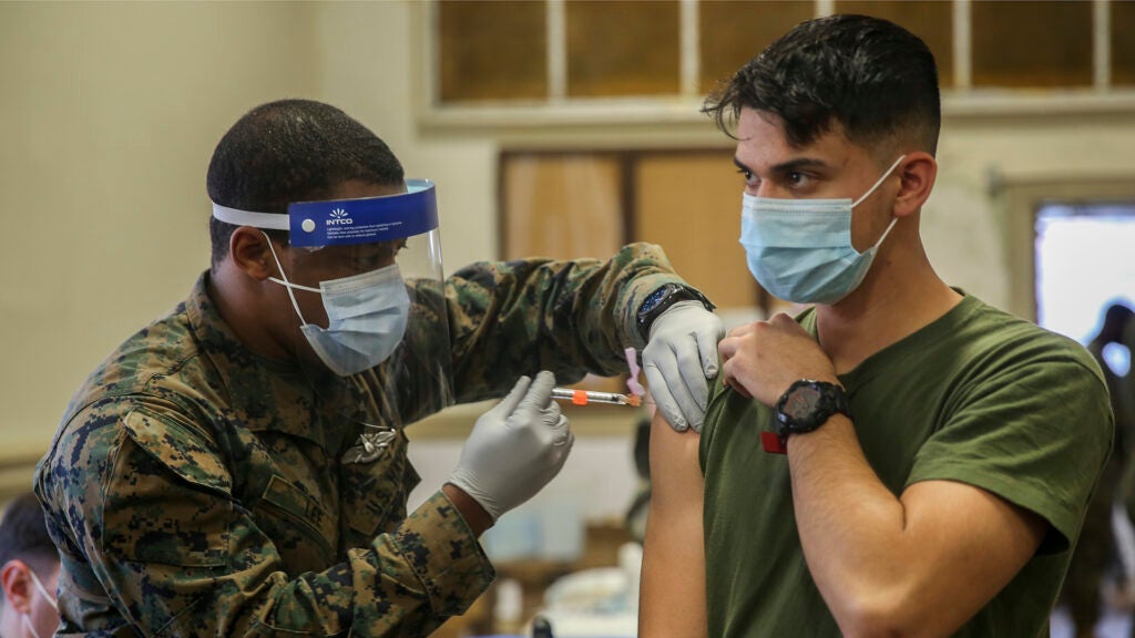 A U.S. Marine with II MEF receives the COVID vaccine on Camp Lejeune, N.C., Jan. 20, 2021. (U.S. Marine Corps photo by Lance Cpl. Samuel Lyden)