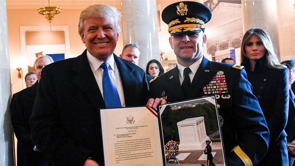 FILE PHOTOL President-elect Donald J. Trump poses for a photo with then-Maj. Gen. Bradley A. Becker at the Tomb of the Unknown Soldier in Arlington National Cemetery, Arlington, Va., Jan. 19, 2017.  (U.S. Army photo by Sgt. Alicia Brand.)
