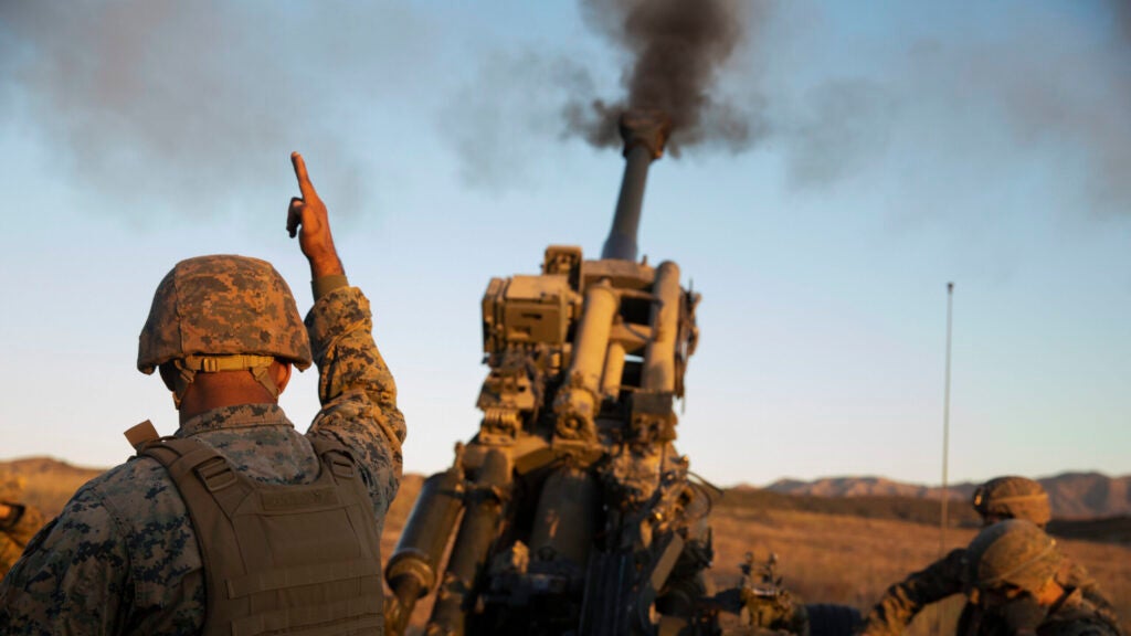 FILE PHOTO: U.S. Marines with 1st Battalion, 11th Marine Regiment, fire an M777 Howitzer during the Fall Fire Exercise (FIREX) at Marine Corps Base Camp Pendleton California, Oct. 23, 2019. The Fall FIREX is a regimental-level exercise designed to allow multiple batteries to train together in preparation for Steel Knight, an annual combat readiness exercise. (U.S. Marine Corps photo by Cpl. Jack C. Howell.)