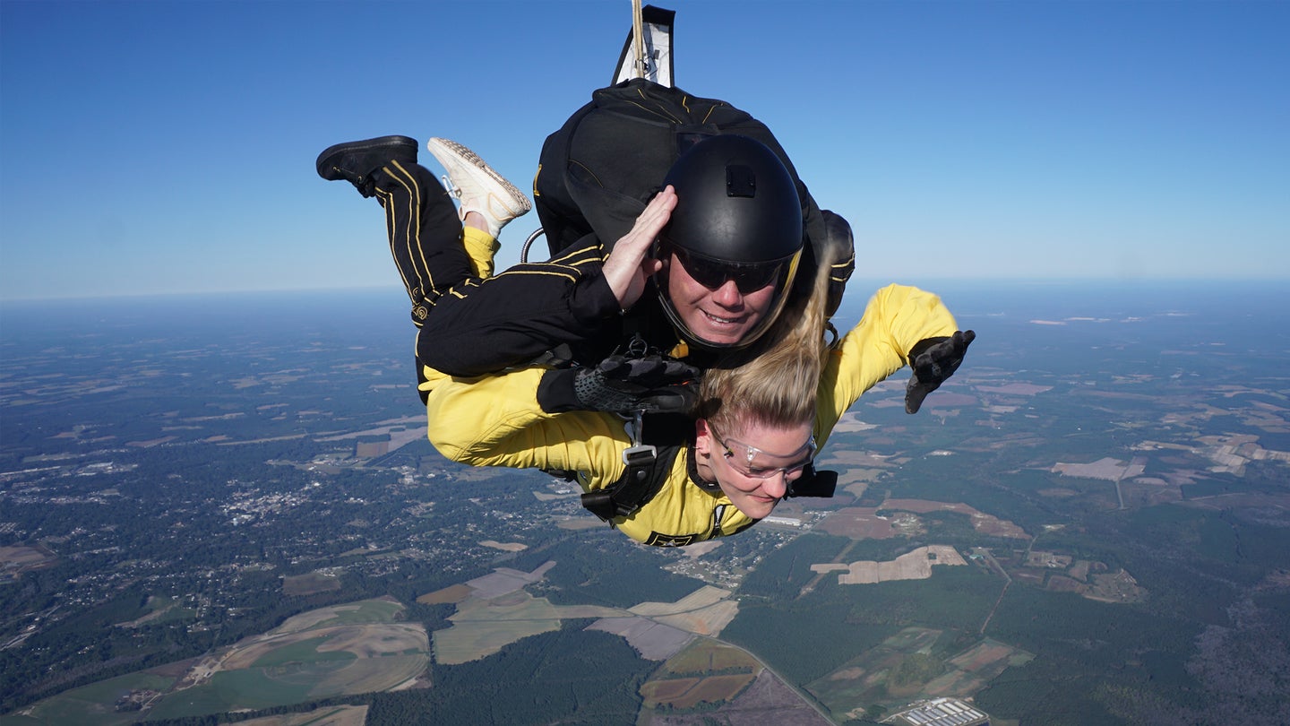 Haley Britzky with Army Sgt. 1st Class Rich Sloan, mid-jump. (U.S. Army/Golden Knights)