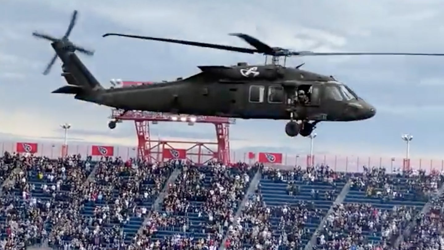 Army helicopters with the 101st Airborne Division gave football fans a close shave last month when they performed a low flyover above Nissan Stadium in Nashville Tennessee on Nov. 14 (Screenshot via Twitter / AndrewTM)