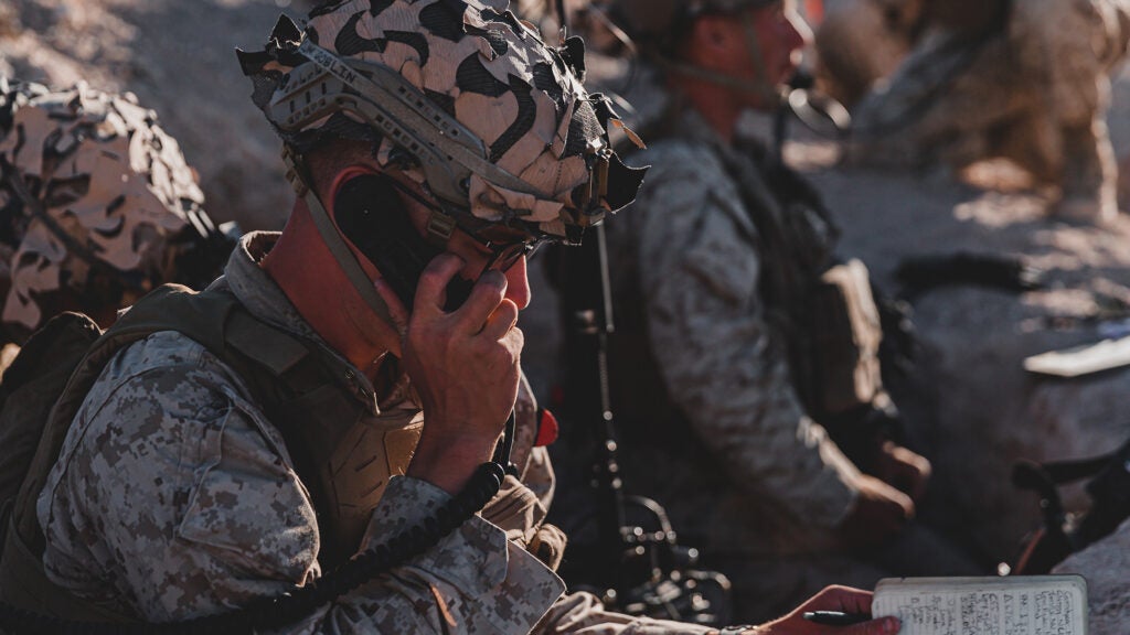 U.S. Marine Corps Lance Cpl. Ian T. Joins, a mortarman with 3rd Battalion, 2nd Marine Regiment, 2nd Marine Division, communicates by radio during the Fire Support Coordination Exercise (FSCEX), a sub event of Integrated Training Exercise 1-22 at Marine Corps Air Ground Combat Center, Twentynine Palms, California, Oct. 5, 2021. FSCEX is designed to challenge the Marine Air Ground Task Force, other U.S. Forces and partner nations military’s ability to coordinate a wide range of high caliber and explosive ordnance from multiple ground and air platforms, ensuring success on a modern battlefield. (U.S. Marine Corps photo by Lance Cpl. Shane T. Beaubien)