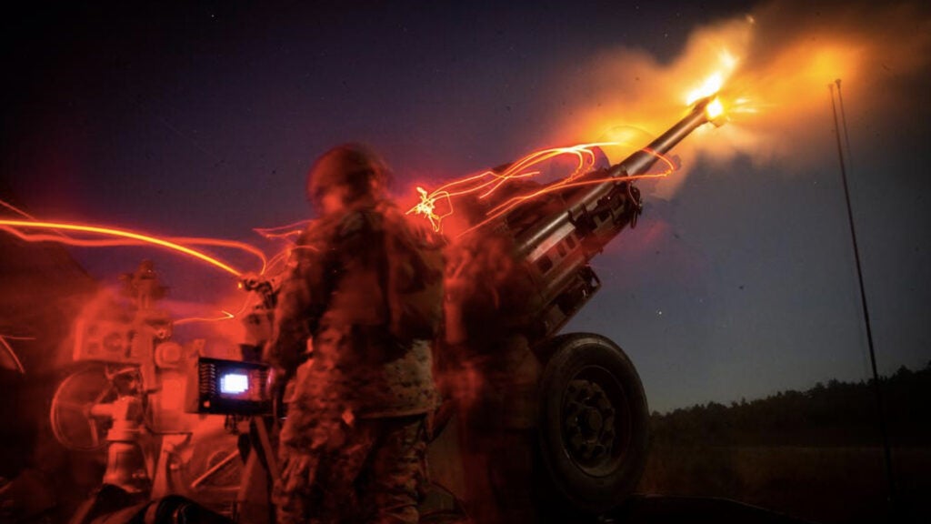 U.S. Marines with 2d Battalion, 10th Marine Regiment, 2d Marine Division, fire an M777 Howitzer during Exercise Rolling Thunder 1-22 on Fort Bragg, N.C., Oct. 19, 2021. (U.S. Marine Corps photo by Lance Cpl. Brian Bolin Jr.)