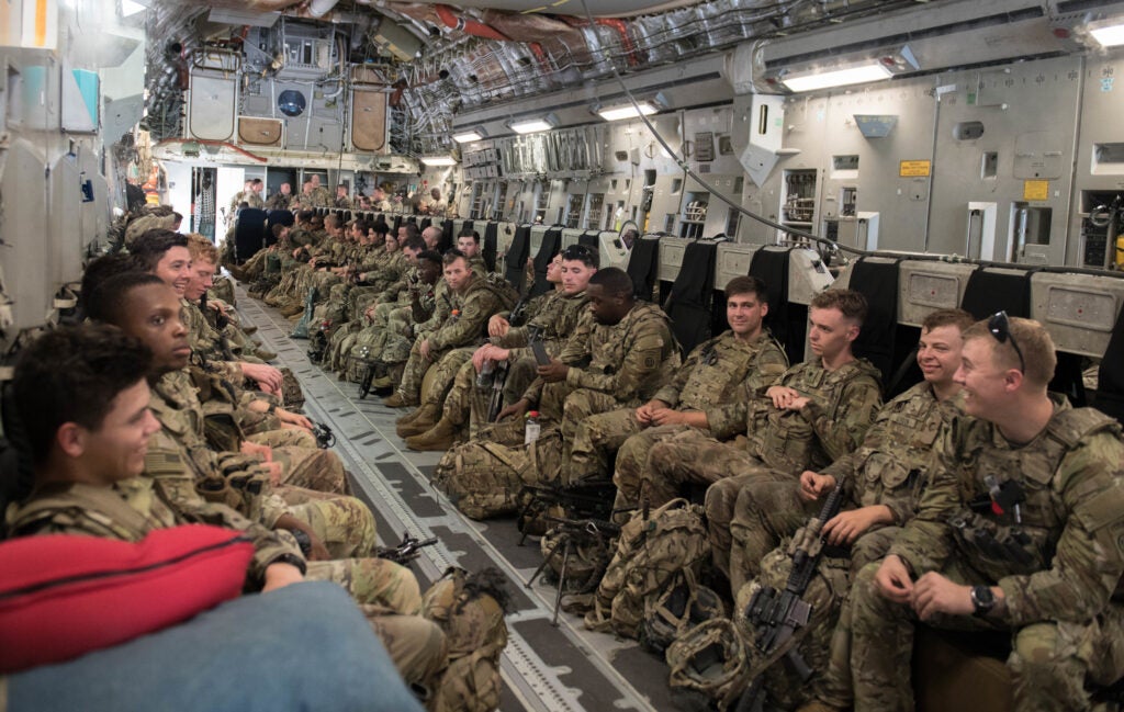 U.S. Army Soldiers assigned to the 82nd Airborne Division, Pope Army Airfield, N.C., pack in a C-17 Globemaster III before departing Joint Base Charleston, S.C., August 14, 2021. The Pentagon recently activated the Immediate Response Force to help in the safe and secure movement of U.S. personnel and Afghan Special Immigration Visa civilians located in the Middle East. (U.S. Air Force photo by Staff Sgt. Dawn M. Weber)