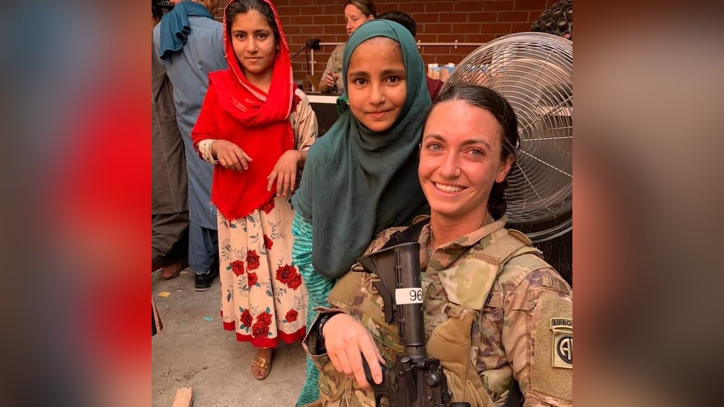 Army Sgt. Breanna Jessop with Afghan children. (U.S. Army)