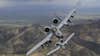 Two A-10C Thunderbolt IIs fly in formation over southern Arizona, April 29, 2019. The A-10 is built around the GAU-8 Avenger 30MM Gatling gun and is capable of carrying an additional 16,000 pounds of munitions under the wings and belly of the aircraft. (Staff Sgt. Betty R. Chevalier/U.S. Air Force)