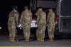 Soldiers from the 3rd U.S. Infantry Regiment (The Old Guard), transfer the remains of  Staff Sgt. Dustin M. Wright of Lyons, Ga., on Dover Air Force Base, Del., Oct. 5, 2017.  Wright was assigned to the 2nd Battalion, 3rd Special Forces Group (Airborne).