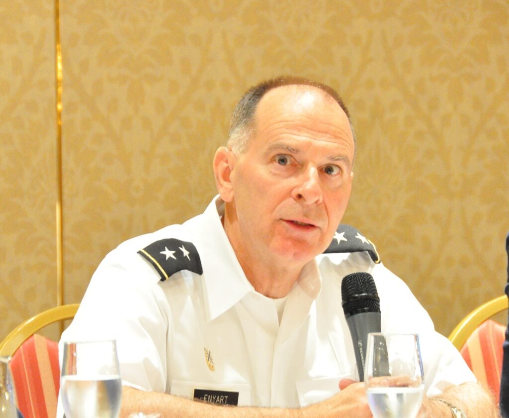 Maj. Gen. William Enyart, the Adjutant General of Illinois, answers questions about the Illinois National Guard State Partnership Program with Poland at the United Nations Peace Operations and Law Symposium in Chicago on July 8.