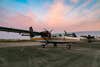 The Army Golden Knights jump aircraft, the DHC-6-400 Viking Twin Otter, is parked in the early morning hours.