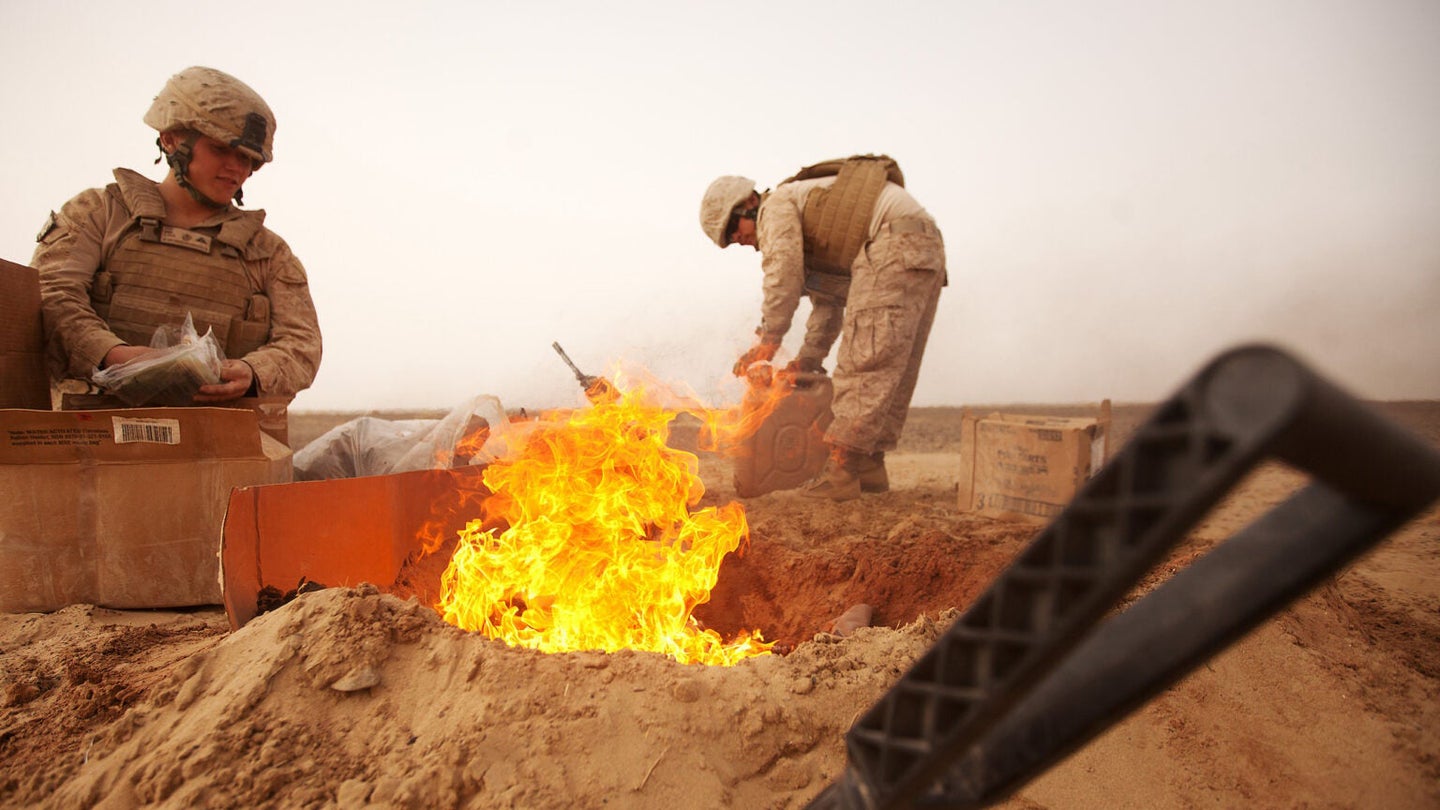 A burn pit for trash in Afghanistan in 2012. (U.S. Marine Corps photo by Cpl. Alfred V. Lopez)