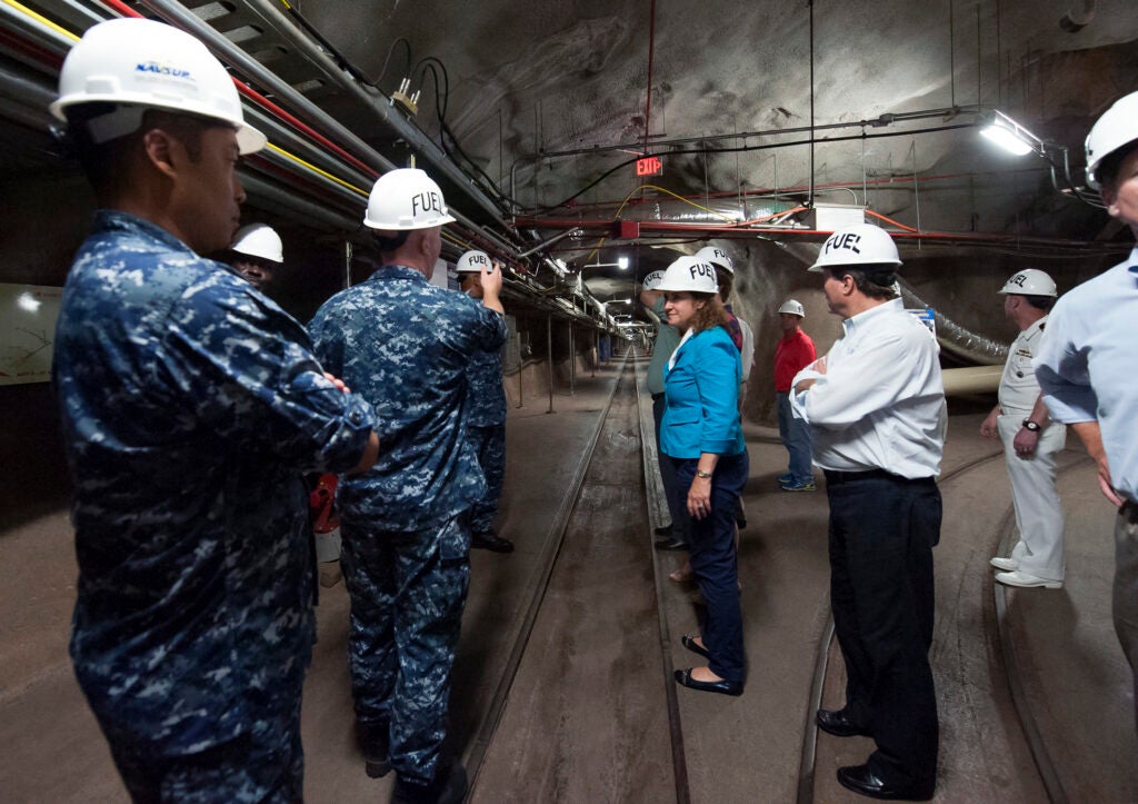 160718-N-WC566-071 PEARL HARBOR (July 19, 2016) Lt. Cmdr. Andrew Lovgren, fuels officer of Fleet Logistics Center Pearl Harbor, briefs a congressional delegation during a visit to the Red Hill Bulk Fuel Facility near Pearl Harbor. Red Hill is a national strategic asset that provides fuel to operate in the Pacific while ensuring drinking water in the area remains safe. (U.S. Navy Photo By Mass Communication Specialist 2nd Class Gabrielle Joyner/RELEASED)