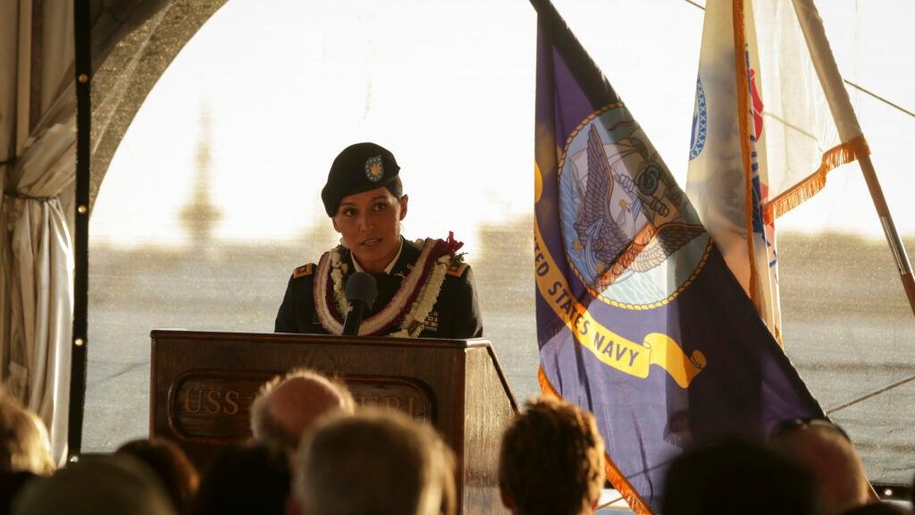 Maj. Tulsi Gabbard, Hawaii National Guardsman and U.S. Representative for the 2nd District of Hawaii speaks during a Veterans Day sunset service aboard the Battleship Missouri Memorial at Joint Base Pearl Harbor-Hickam, Nov. 11, 2015. (U.S. Marine Corps photo by Lance Cpl Maximiliano Rosas/Released)
