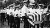 An honor guard of the U.S. Navy carries the coffin bearing the remains of Radioman 3rd Class Emil E. White, one of two sailors killed in a terrorist attack on a Navy bus in Puerto Rico, Dec. 9, 1979.  White was buried Saturday in a ceremony attended by Virgin Islands governor Juan Luis, himself a Puerto Rican, and Rear Admiral Arthur Knoizen, senior U.S. naval officer in the Caribbean.  (AP Photo/HH)