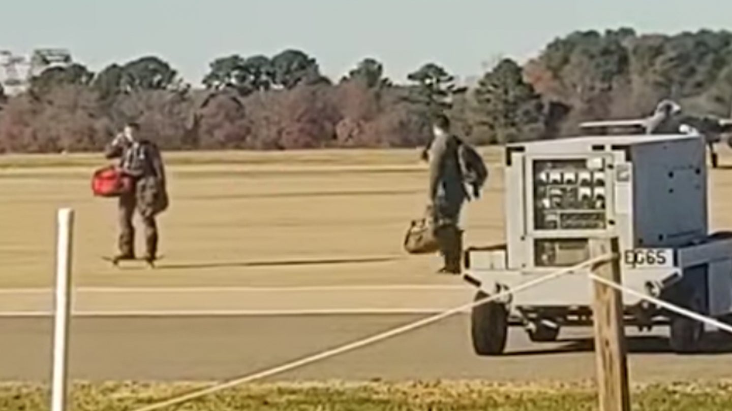 A video posted to Facebook on Monday shows an airman with the 23rd Fighter Wing skateboarding down the flight line at Joint Base Langley-Eustis (Screenshot via Facebook / Air Force amn/nco/snco)