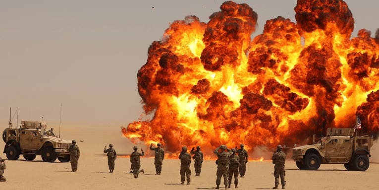 Soldiers re-enlisting in front of a massive explosion is one of the military’s best photos of 2021