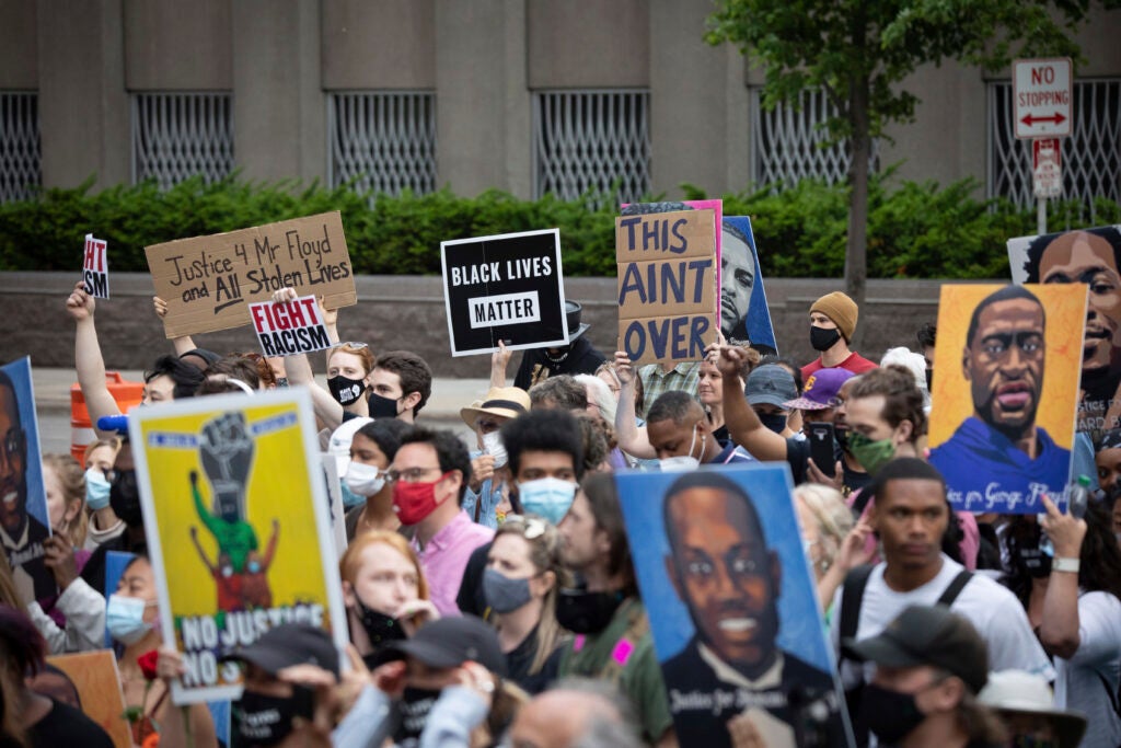 People march for the one year anniversary of George Floyd's death on Sunday, May 23, 2021, in Minneapolis, Minn. (AP Photo/Christian Monterrosa)