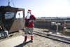 SABARI DISTRICT, AFGHANISTAN - DECEMBER 25:  A US soldier from the 101st Airborne dressed as Santa Claus poses for a picture  after a mortar attack at a combat outpost at the Sabari District Center on Christmas Day December 25, 2008 in Sabari District, Khost Province, Afghanistan.  Khost province borders the Waziristan region in Pakistan, where it is believed foreign fighters cross into Afghanistan to combat coalition forces.  (Photo by Jonathan Saruk/Getty Images)