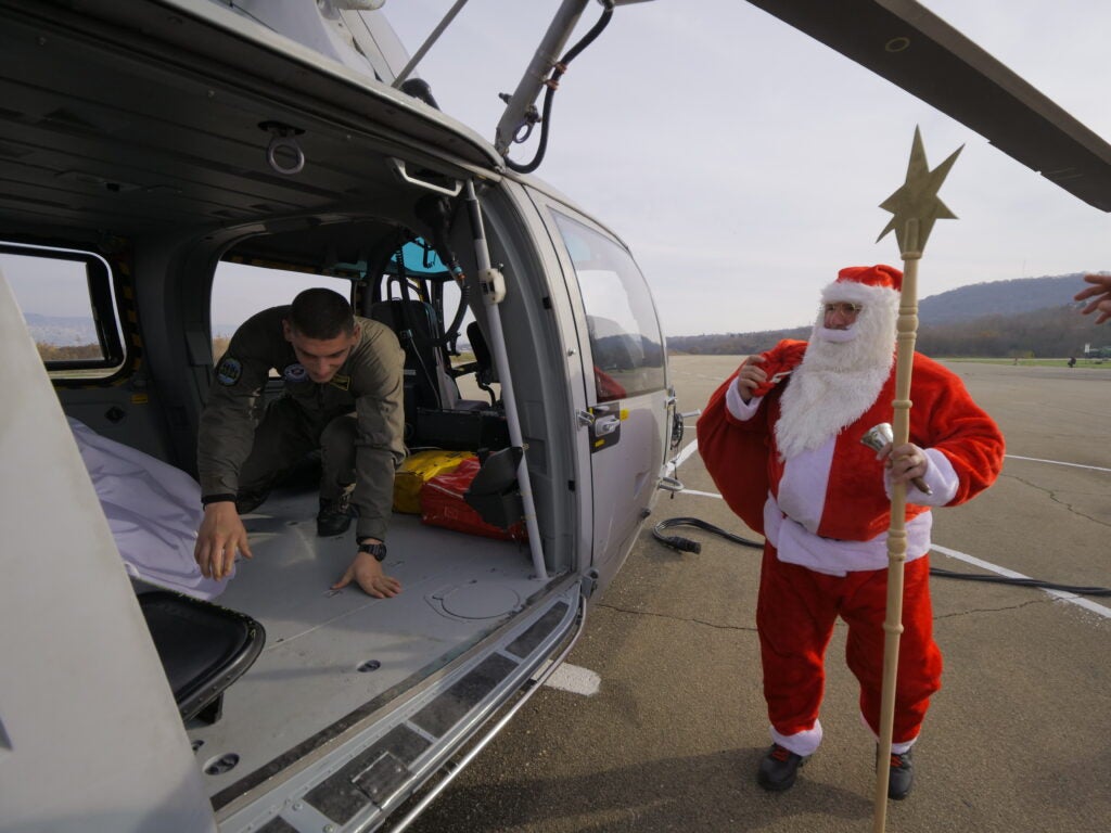 Santa Claus went on a helicopter during a Christmasparty in Military base in the Black sea town of Varna, Bulgaria on 20 December 2019. (Photo by /Impact Press Group/NurPhoto via Getty Images)