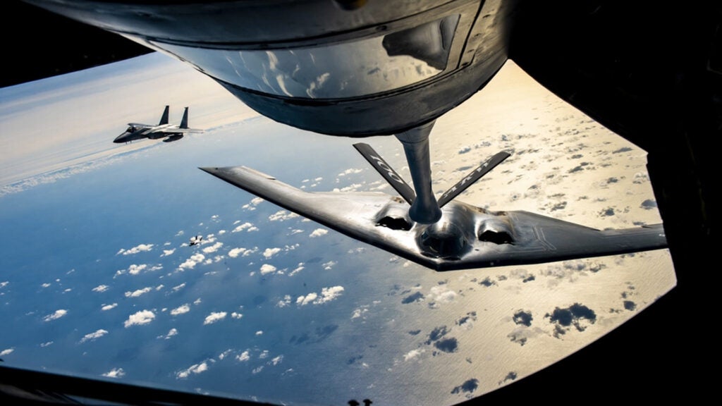 A B-2 Spirit Stealth Bomber from the 509th Bomb Wing, Whiteman Air Force Base, Missouri, flies behind a KC-135 Stratotanker from the 100th Air Refueling Wing, RAF Mildenhall, England, during a training mission for Bomber Task Force Europe over England on Sept. 16, 2019 (U.S. Air Force photo/ Senior Airman Kelly O'Connor)