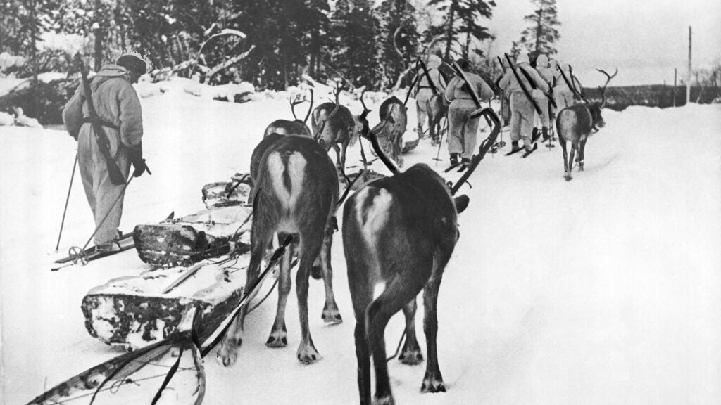 This file photo shows Finnish soldiers with their reindeer on March 28, 1940. (AP Photo)