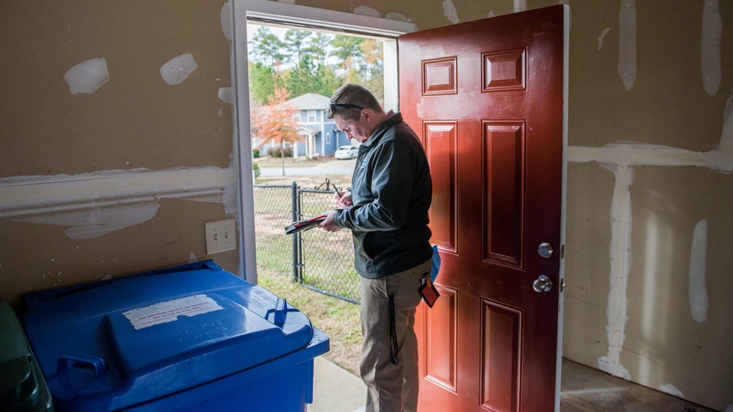 At Fort Benning Nov. 21, 2019, a housing inspector carries out a quality assurance inspection of a home in the Patton Village housing area with the aim of having it ready for occupancy by a military family. Fort Benning during the past year has made housing inspections much more stringent as part of a broad effort to improve on-post housing services. (Army photo / Patrick Albright)