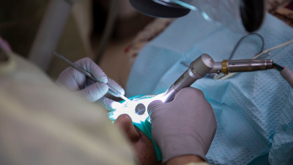 A drill digs into the enamel during the root canal process during a dental procedure on Sept. 14, 2020, Camp Arifjan, Kuwait. Tools like these help ensure that patients can receive the best dental care despite being in a deployed environment. (Photo by U.S. Army Reserve Sgt. Jermaine Jackson)