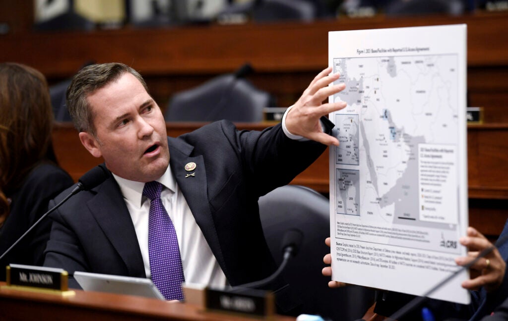 Rep. Michael Waltz, R-Fla., displays a map during a House Armed Services Committee hearing on the conclusion of military operations in Afghanistan, Wednesday, Sept. 29, 2021, on Capitol Hill in Washington. (Olivier Douliery/Pool via AP)