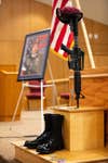 A maroon beret, jump boots and M4-carbine stand in front of a photo of Spc. Enrique Roman-Martinez during his memorial ceremony at the All American Chapel on Fort Bragg, N.C., August 13, 2020.