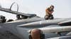 Staff Sgt. Taylor West, an F-15 crew chief deployed to the 332d Air Expeditionary Wing, fixes a malfunction on top of the aircraft shortly before takeoff, Sept. 17, 2020. The mission was not delayed and was completed successfully thanks to West’s quick action. (U.S. Air National Guard photo by Master Sgt. Jonathan Young)