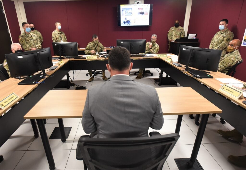 Maj. Michael Yates (center), chief psychologist at U.S. Army Recruiting Command, briefs senior Army officials on instructions that raters will be need to follow for the developmental out-brief of the Colonels Command Assessment Program that will begin at Fort Knox Sept. 11, 2020. Like its battalion counterpart, CCAP is expected to thoroughly assess several colonels vying for strategic command and staff slots.
