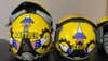 Helmets worn by pilots with the U.S. Air Force 336th Fighter Squadron sport cogs, callsigns and, most importantly, the color yellow. (Air Force photo)