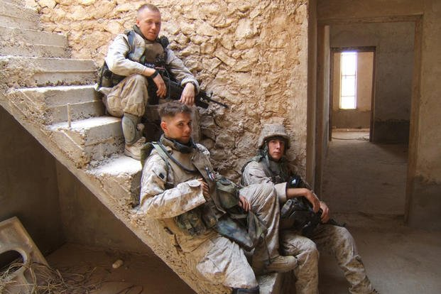 Ruben Gallego, center, as a U.S. Marine with Lima Company, 3rd Battalion, 25th Marine Regiment, in Iraq. 
(Courtesy photo via "They Called Us Lucky")