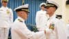 Commander of the 30th Naval Construction Regiment, Capt. Jeffrey Killian, places the Meritorious Service Medal on Cmdr. Jeffrey Lengkeek during his change of command ceremony on Camp Shields in Okinawa, Japan, July 8, 2016. (U.S. Navy photo by Mass Communication Specialist 1st Class Rosalie Chang)