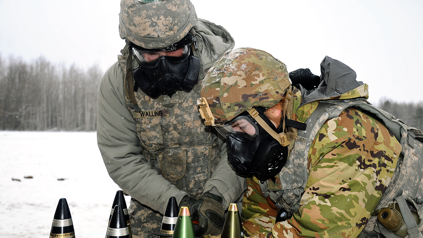 U.S. Army soldiers assigned to 1st Battalion, 120th Field Artillery Regiment, Wisconsin Army National Guard, implement battle drills such as reacting to simulated chemical attacks and other forms of enemy contact during Northern Strike 22-1/“Winter Strike”, Camp Grayling Joint Maneuver Training Center, Michigan, Jan. 25, 2022. (U.S. Air National Guard photo by Master Sgt. David Kujawa) 