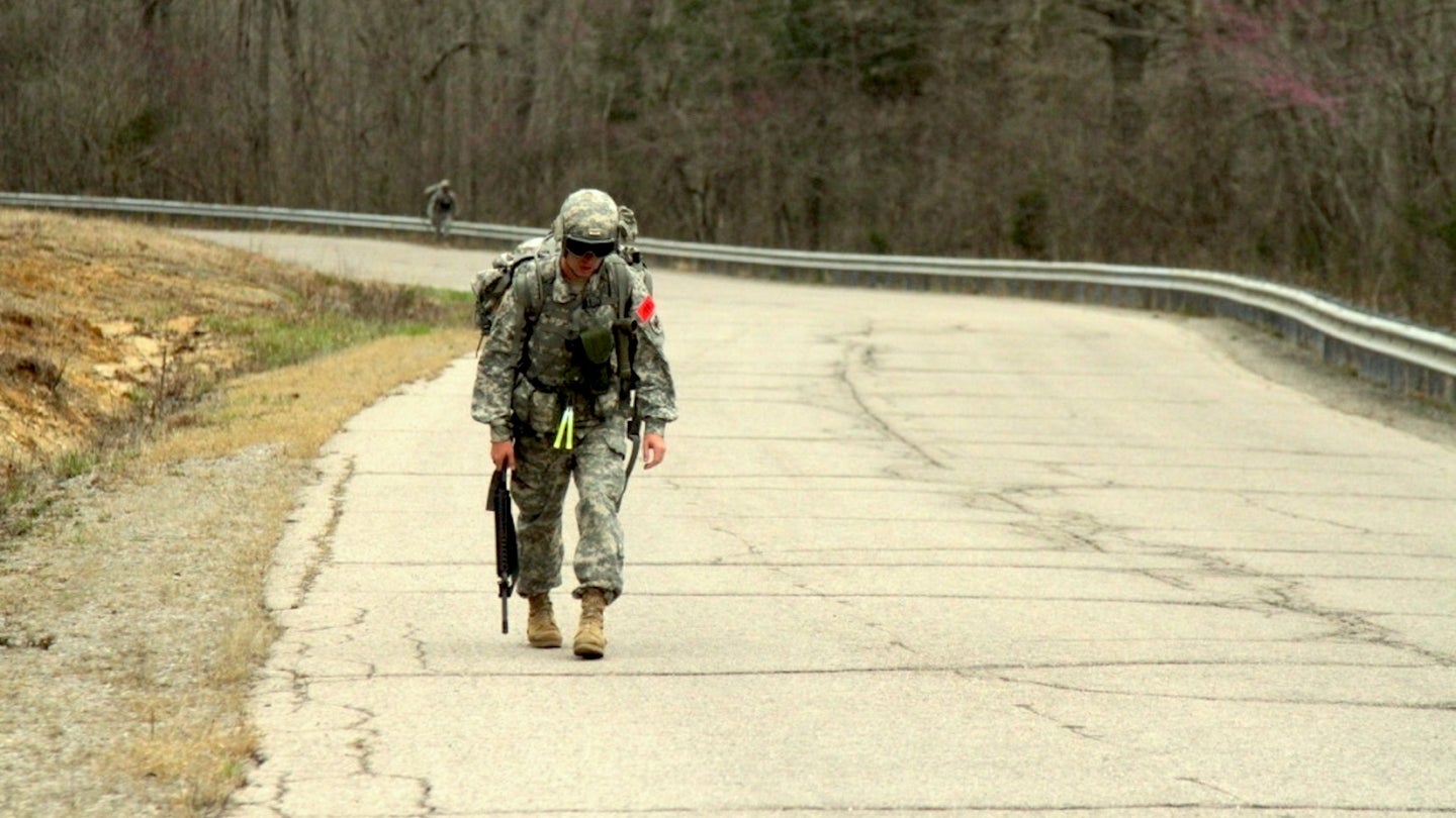 U.S. Army Sgt. Jordan Sapp, assigned to 11th Aviation Command, nears the top of Misery hill and the end of the Ruck March event during the joint Best Warrior Competition hosted by 84th Reserve Training Command at Ft. Knox, Ky., March 23, 2016