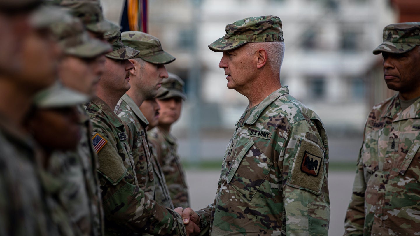 U.S. Army National Guard Director, Lt. Gen. Jon A. Jensen, awards Soldiers for outstanding service at Bemowo Piskie Training Area, Poland, October 1, 2021. (Spc. Osvaldo Fuentes/U.S. Army)
