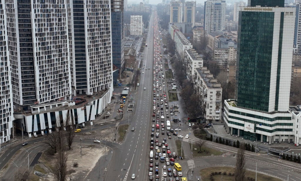 Traffic jams are seen as people leave the city of Kyiv, Ukraine, Thursday, Feb. 24, 2022. Russian President Vladimir Putin on Thursday announced a military operation in Ukraine and warned other countries that any attempt to interfere with the Russian action would lead to "consequences you have never seen." (AP Photo/Emilio Morenatti)