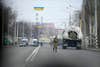 A Ukrainian soldier stands next to a military vehicle on a road in Kramatosrk, eastern Ukraine, Thursday, Feb. 24, 2022. Russian troops launched a wide-ranging attack on Ukraine on Thursday. President Vladimir Putin cast aside international condemnation and sanctions and warned other countries that any attempt to interfere would lead to "consequences you have never seen." (AP Photo/Vadim Ghirda)