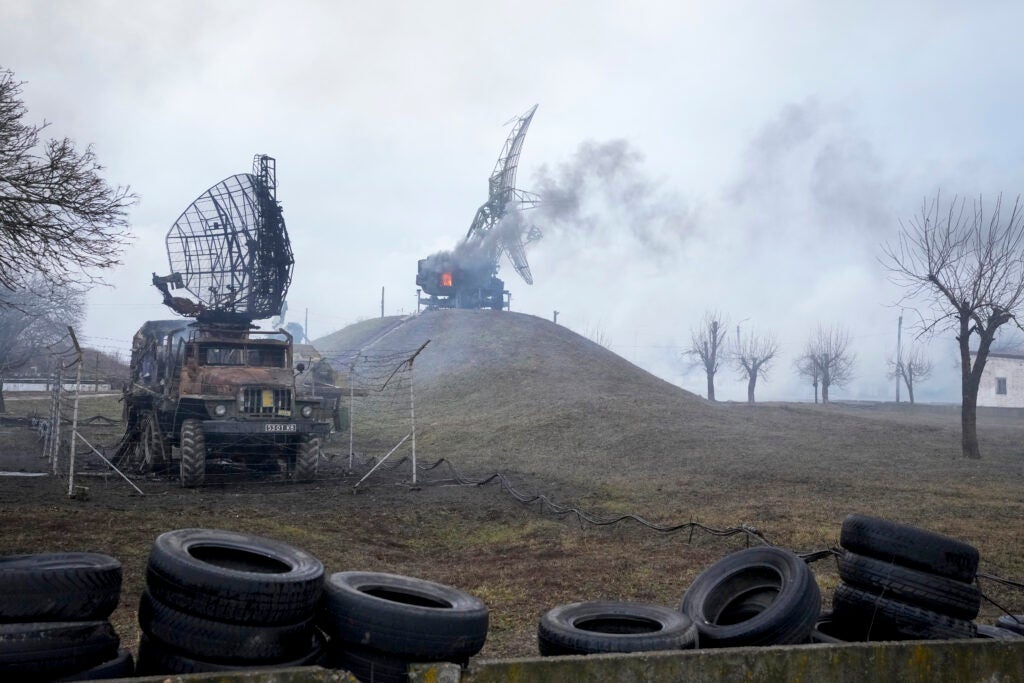 Damaged radar arrays and other equipment is seen at Ukrainian military facility outside Mariupol, Ukraine, Thursday, Feb. 24, 2022. Russia has launched a barrage of air and missile strikes on Ukraine early Thursday and Ukrainian officials said that Russian troops have rolled into the country from the north, east and south. (AP Photo/Sergei Grits)